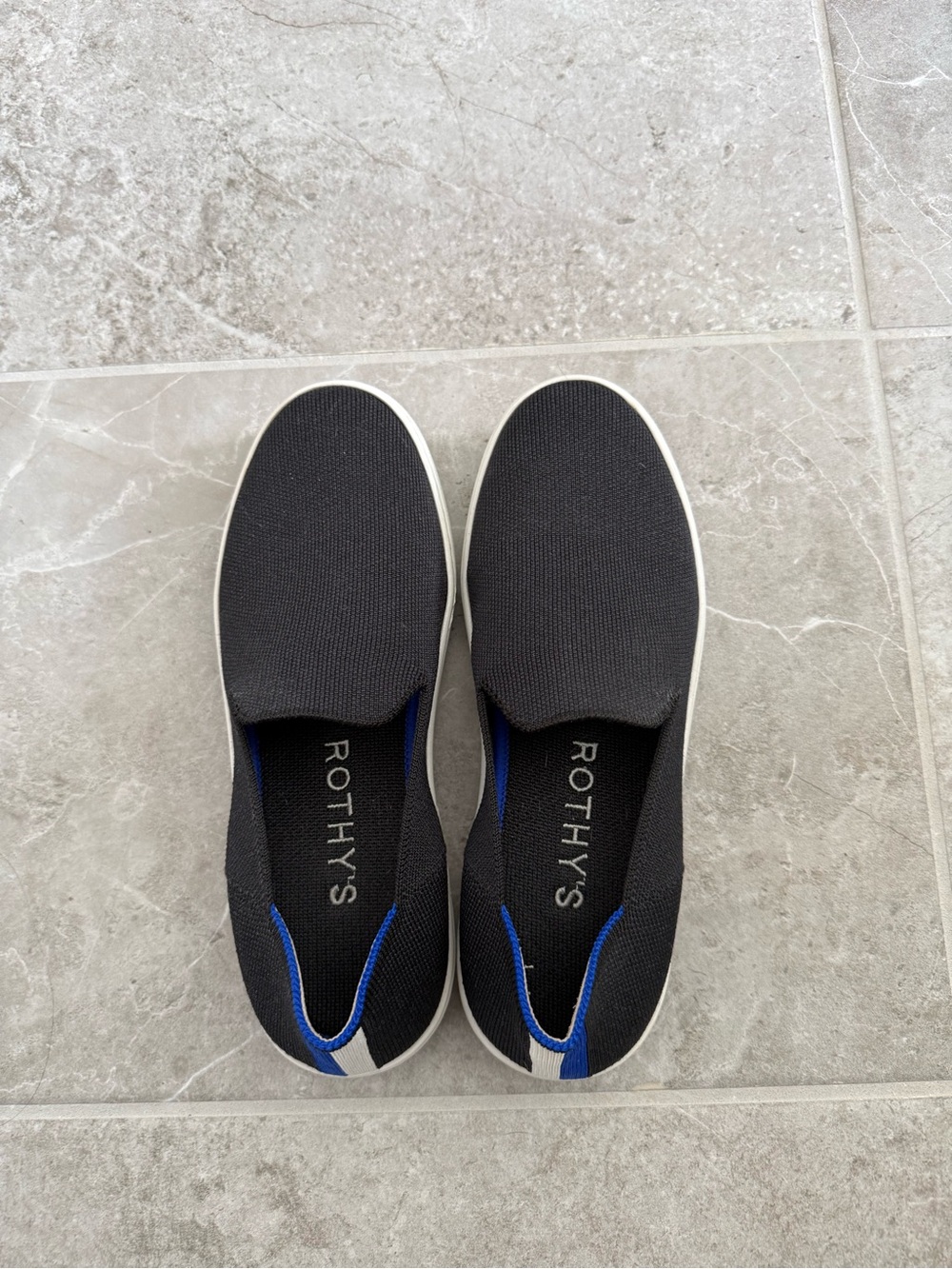 Rothy's Black Slip-On Loafers with Blue Trim